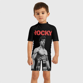 Детский купальный костюм 3D с принтом ROCKY в Петрозаводске, Полиэстер 85%, Спандекс 15% | застежка на молнии на спине | creed | jordan | lundgren | mix fight | mixfight | stallone | ufc | бальбоа | бокс | джордан | крид | лундгрен | мышцы | ринг | роки | рокки | сильвестр | сталлоне | сталоне