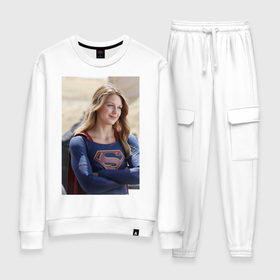 Женский костюм хлопок с принтом Supergirl в Петрозаводске, 100% хлопок | на свитшоте круглая горловина, мягкая резинка по низу. Брюки заужены к низу, на них два вида карманов: два 